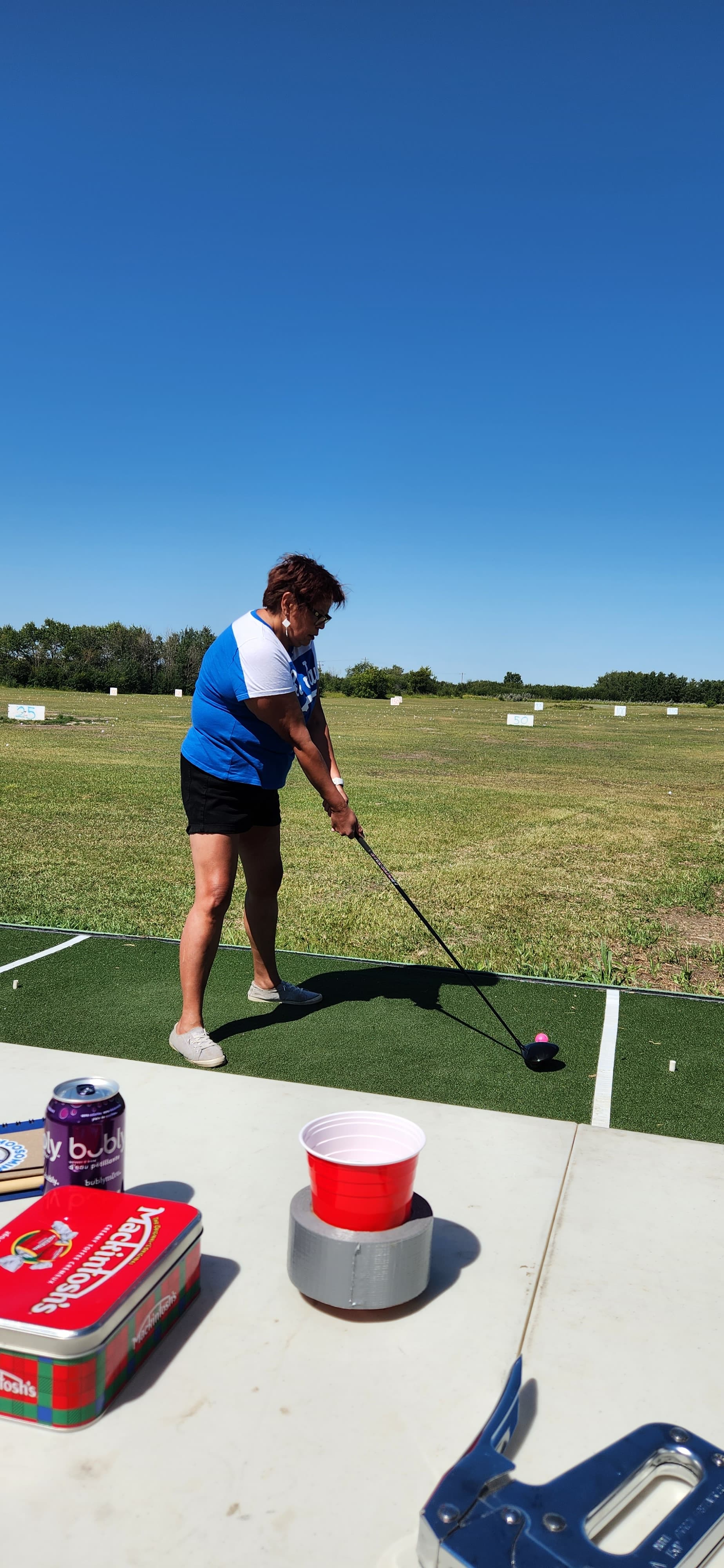 Golfer mid-swing